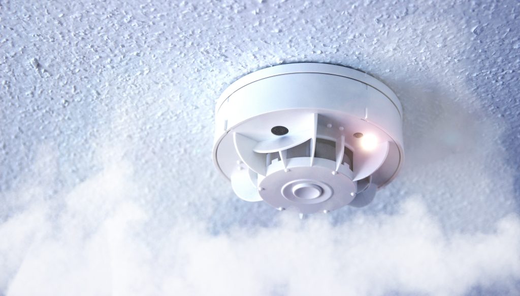 Interconnected smoke detector with LED light