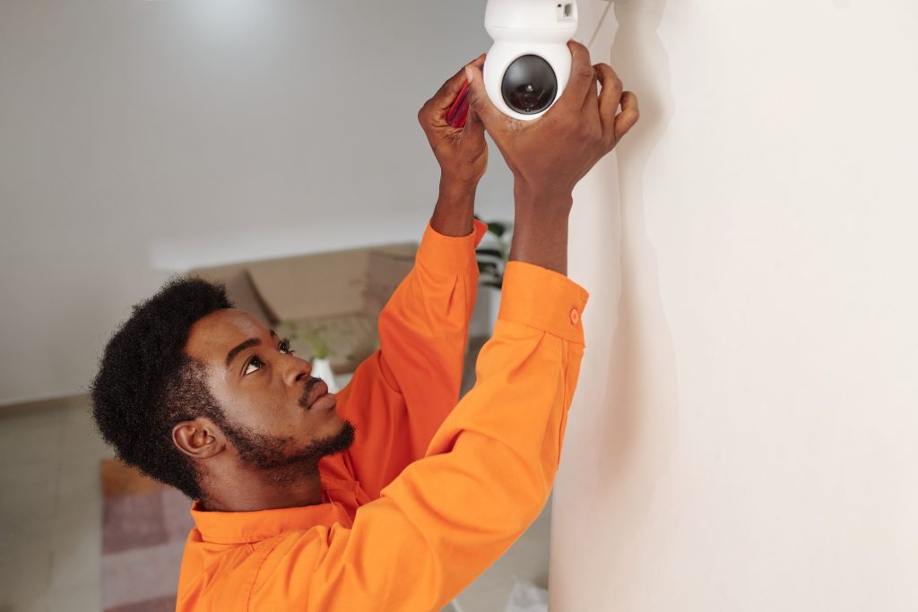 Technician installing camera